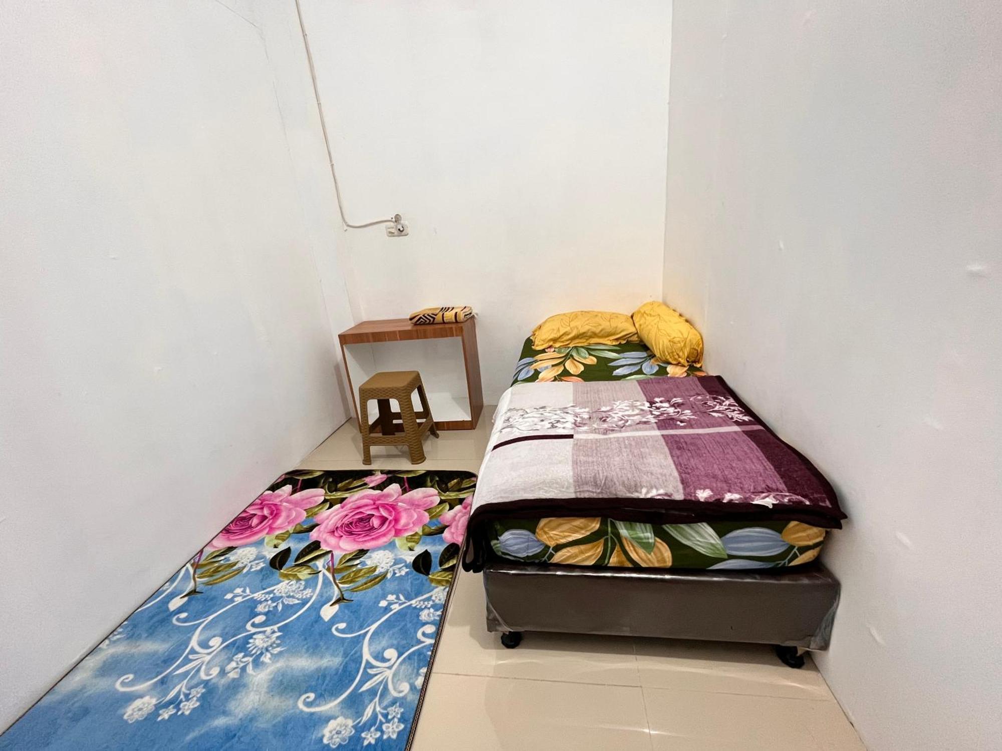 Rumah 25 Syariah Букиттинги Номер фото